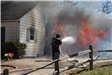 Firefighters at a House Fire 8