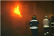 Firefighters at the Scene of a Fire